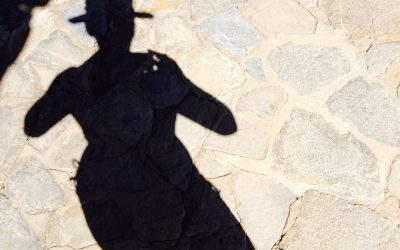 Greetings from the shadow in the hat